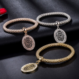 Tri Color Oval Charm Bangle Set